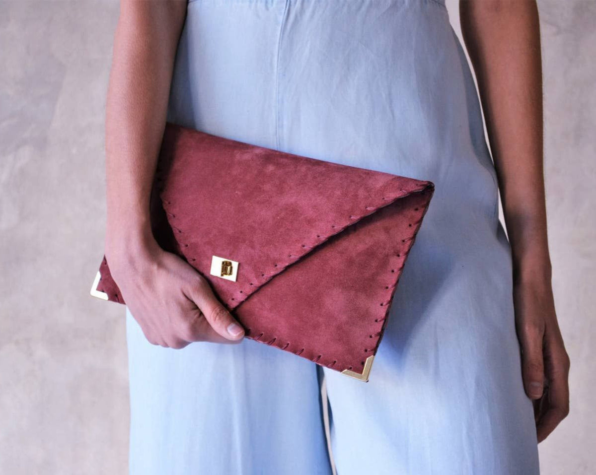 Bolso mano Symmetria carmín